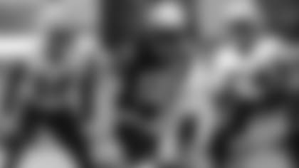 From left to right: RB/WR Ty Montgomery (14), linebacker Anfernee Jennings (58), and offensive lineman Arlington Hambright (74).