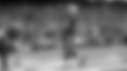 Patriots running back Rhamondre Stevenson celebrates after rushing for a touchdown against the Dallas Cowboys.