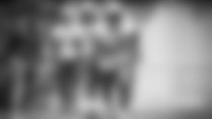 Patriots running back Damien Harris (37) runs through a drill during minicamp.