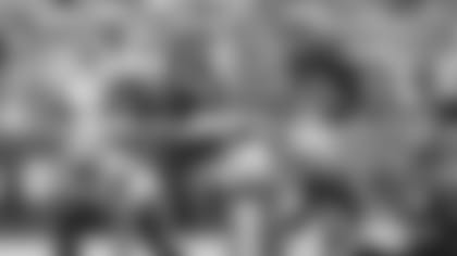 Pictured are Patriots defensive back Jack Jones (13), special teamer Brenden Schooler (41), guard Cole Strange (69) and defensive back Marcus Jones (25).