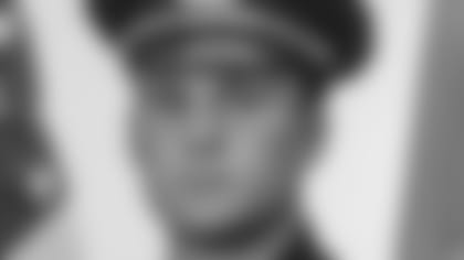 This undated photo released by the Boston Police Department's official Twitter account Saturday, March 28, 2015, shows Officer John Moynihan, 34, who was shot in the face during a traffic stop Friday night that ended when other officers fatally shot his attacker. Moynihan was struck just below his right eye and was listed in critical condition Saturday as the bullet remained lodged below his right ear. A decorated veteran, Moynihan served in Iraq in 2006-2007 and was honored at the White House in May 2014 for being one of the first responders in Watertown, Mass., following the April 2013 gun battle with the Boston Marathon bombers. (AP Photo/Boston Police Department)