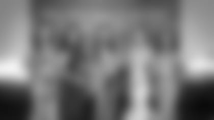 Cheerleaders Amanda (left), Allison (left of center) and Julia (center)Photo courtesy of Creative Sparks Imagery