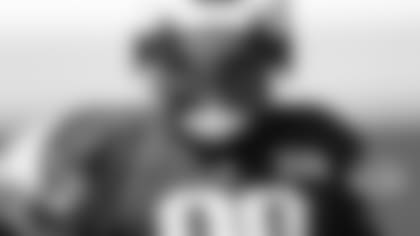 Patriots defensive lineman Christian Barmore (90).