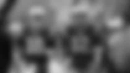 New England Patriots quarterbacks Jimmy Garoppolo, left, and Tom Brady take the field for warm ups before an NFL football game against the Philadelphia Eagles, Sunday, Dec. 6, 2015, in Foxborough, Mass. (AP Photo/Charles Krupa)