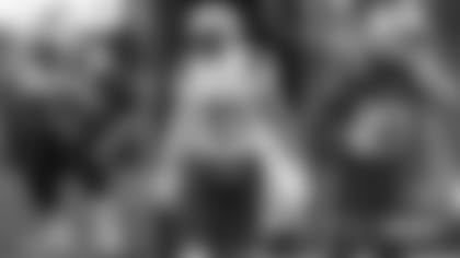 From left to right: Offensive lineman Michael Onwenu, safety Adrian Phillips and cornerback J.C. Jackson.