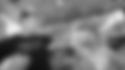 Rob Gronkowski high fives an athlete at the Special Olympics in Ashland.Photo by Eric J. Adler