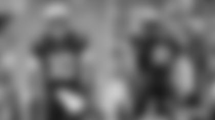 Patriots quarterback Mac Jones (10) and defensive lineman Deatrich Wise, Jr. (91).