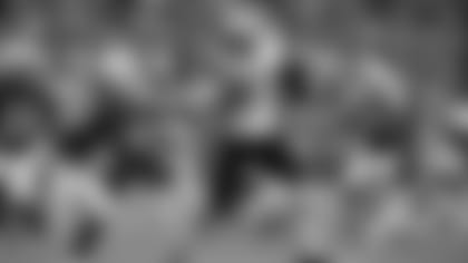 New England Patriots tight end Rob Gronkowski (87) pushes away from Indianapolis Colts free safety Dwight Lowery (33) on his way to a touchdown in the second half of an NFL football game in Indianapolis, Sunday, Oct. 18, 2015.  (AP Photo/John Minchillo)