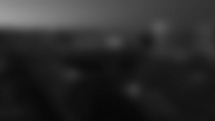 Watch recent drone footage of Allegiant Stadium as it lights up the Las Vegas skyline as the stadium continues towards completion.