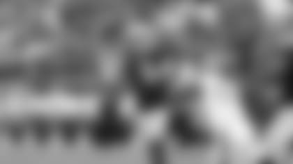 Oakland Raiders quarterback Derek Carr (4) passes against Cleveland Browns linebacker Genard Avery (55) during overtime of an NFL football game in Oakland, Calif., Sunday, Sept. 30, 2018. The Raiders won 45-42. (AP Photo/D. Ross Cameron)