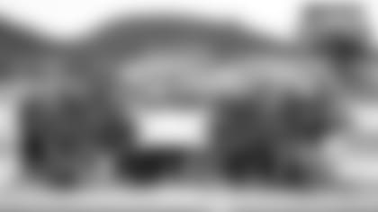 De Anza High School's football coach, Tyree Reed is awarded with the Tom Flores High School Coach of the Week by Raiders alumnus, Courtney Anderson, and the Raiderettes at De Anza High School, Wednesday, September 12, 2018, in Richmond, California.