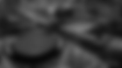 Allegiant Stadium at night with Las Vegas Strip