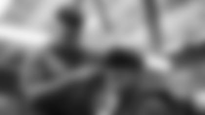 Students receive free haircuts and beautician services for the back to school season courtesy of the Las Vegas Raiders at Masterpiece Barber School.