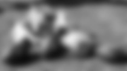 Footballs and equipment.