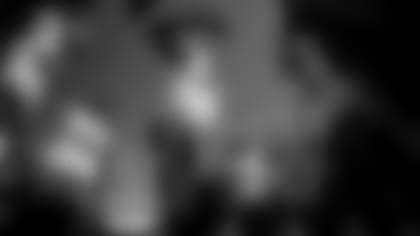 DE Calais Campbell leads a huddle.