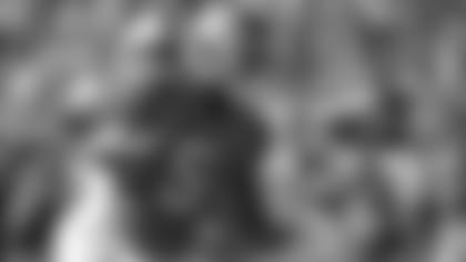 Clemson's Tee Higgins runs in for a touchdown after catching a pass during the first half of an NCAA college football game.