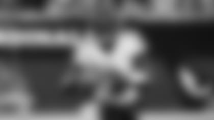 Baltimore Ravens quarterback Tyler Huntley (2) looks to pass against the Arizona Cardinals during the first half of an NFL preseason football game, Sunday, Aug. 21, 2022, in Glendale, Ariz.