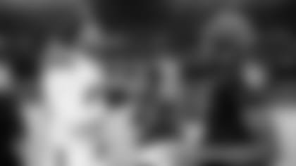 Baltimore Ravens quarterback Lamar Jackson (8) shakes hands with Cleveland Browns defensive end Myles Garrett (95) after defeating the Cleveland Browns 16-10 on Sunday, November 28, 2021 in Baltimore, Maryland.