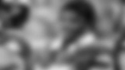 Quarterback Lamar Jackson smiles on the sideline at the Pro Bowl. (Baltimore Ravens/Shawn Hubbard)