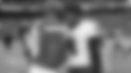 Kansas City Chiefs outside linebacker Justin Houston (50) shakes hands with Baltimore Ravens quarterback Lamar Jackson (8) following an NFL football game on Sunday, Dec. 9, 2018 in Kansas City, Mo. (Ben Liebenberg via AP)