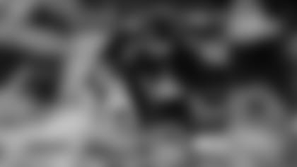 NBC sideline reporter Michele Tafoya films a postgame segment with kicker Justin Tucker