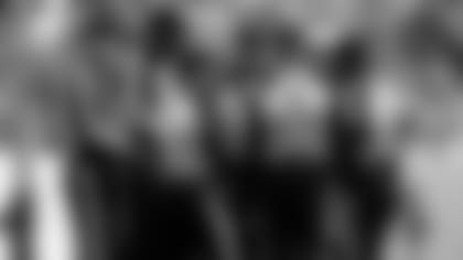 Officials discuss a call during the first half of an NFL football game.