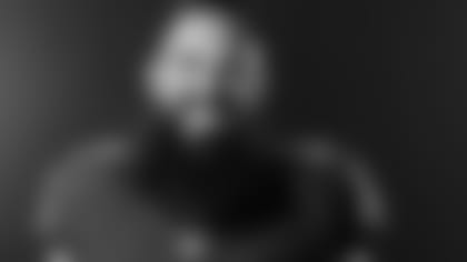 Former S Eric Weddle poses on media day.