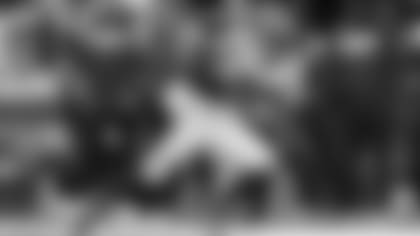 New York Giants running back Saquon Barkley (26) runs the ball up the field during an NFL football game against the Green Bay Packers at Tottenham Hotspur Stadium in London, Sunday, Oct. 9, 2022.