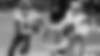 Left: QB Lamar Jackson; Right: Cowboys QB Dak Prescott