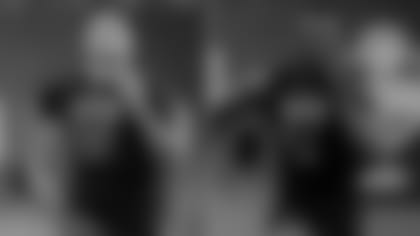 Utah defensive lineman Bradlee Anae and Oklahoma linebacker Kenneth Murray run the 40-yard dash at the NFL football scouting combine in Indianapolis.