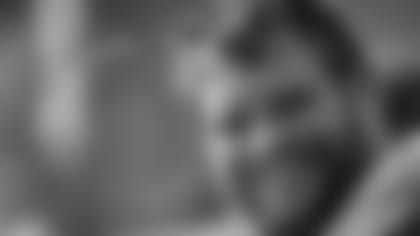 G/T Marshal Yanda smiles on the sidelines of an NFL game.