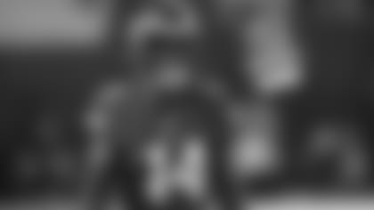 Minnesota Vikings wide receiver Stefon Diggs walks on the field during the first half of an NFL football game.