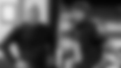 Left: GM Eric DeCosta; Right: QB Lamar Jackson