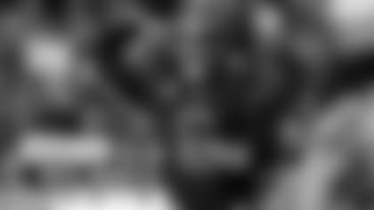 Cleveland Browns quarterback Baker Mayfield throws a pass during an NFL game.