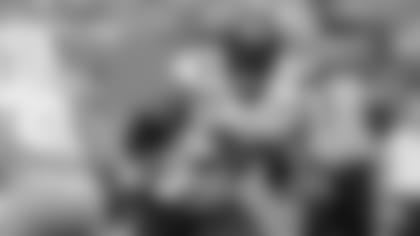 New York Jets offensive tackle Morgan Moses (78)) blocks during an NFL football game against the Miami Dolphins, Sunday, Dec. 19, 2021, in Miami Gardens, Fla.