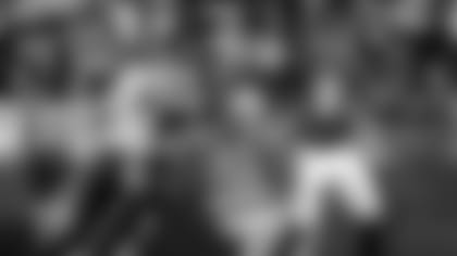 Lamar Jackson throws a pass.