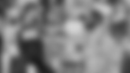 Left: Pittsburgh Steelers QB Ben Roethlisberger (7); Right: Steelers head coach Mike Tomlin