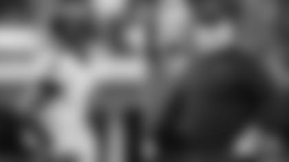 Left: QB Lamar Jackson; Right: OC Greg Roman in 2019