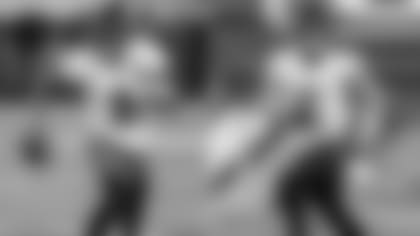 Left: QB Tyler Huntley; Right: QB Trace McSorley