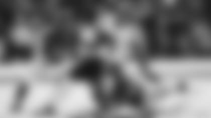 Baltimore Ravens safety Chuck Clark (36) and cornerback Marlon Humphrey (44) miss a tackle of Cincinnati Bengals wide receiver Ja'Marr Chase (1) before he took off for a long touchdown on a reception during the second half of an NFL football game, Sunday, Oct. 24, 2021, in Baltimore.