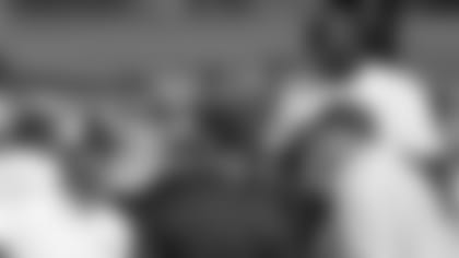 Baltimore Ravens head coach John Harbaugh, left, and general manager Ozzie Newsome, top right, talk with NFL commissioner Roger Goodell, center, and former NFL coach John Madden, far right, during the NFL football team's training camp, Wednesday Aug. 4, 2010, in Westminster, Md.