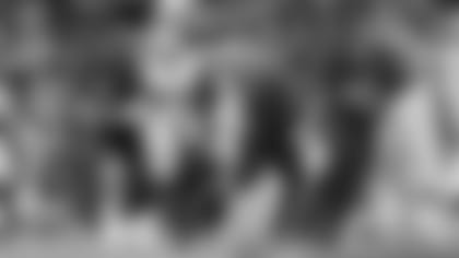 Left: QB Tyler Huntley; Right: DT Justin Madubuike