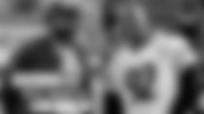 Steelers head coach Mike Tomlin and Former Pittsburgh Steelers linebacker James Harrison