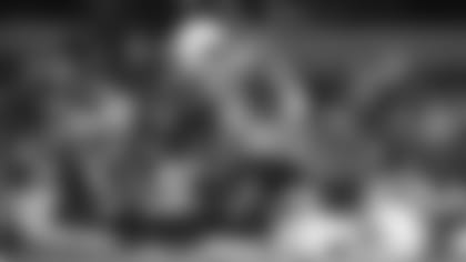 Odafe (center) and teammates after winning the 2019 NY6 Cotton Bowl.