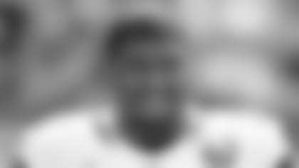 Calais Campbell heads to the bench before a NFL game.