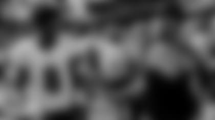 QB Lamar Jackson and head coach John Harbaugh