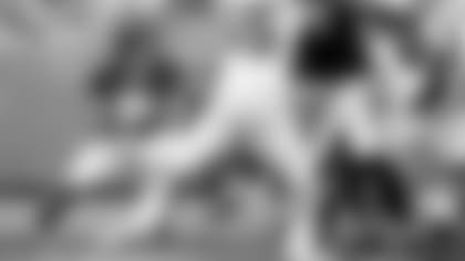 RB J.K. Dobbins run the ball against the Carolina Panthers at Bank of America Stadium in Charlotte, NC.