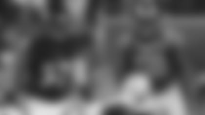 ILB Josh Bynes and ILB Los Angeles Rams’ Corey Littleton during an NFL game.