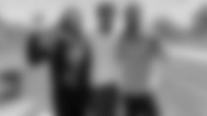 Marquise Brown, Lamar Jackson and Antonio Brown take a picture after working out.