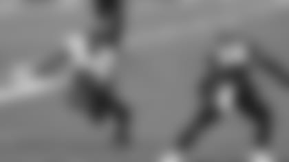 Baltimore Ravens running back J.K. Dobbins (27) tries to avoid Cincinnati Bengals cornerback LeShaun Sims (38) during the second half of an NFL football game, Sunday, Jan. 3, 2021, in Cincinnati. (AP Photo/Aaron Doster)